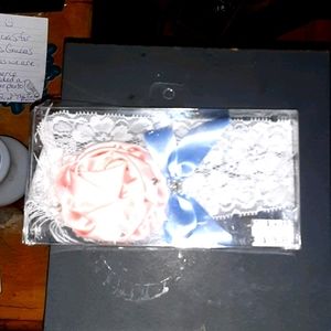 Garter Wedding with blue ribbon, rose